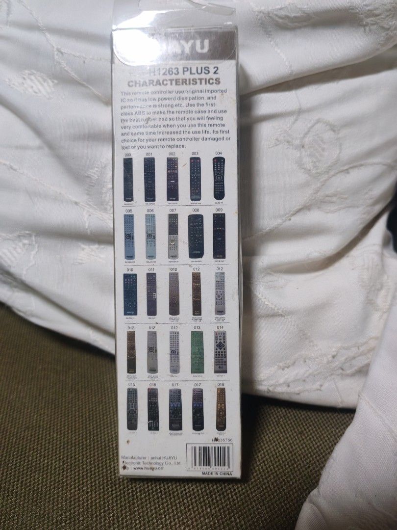 HUAYU RM-H1263 PLUS 2 Home Theater Remote Control (Category: TV Parts & Accessories) located in Trece Martires City. Submitted by chipmaster74 (Listing ID 1466780709, Image 2). Description: - Model: HUAYU RM-H1263 PLUS 2 Home Theater Universal Remote - Condition: Like new, and still in original plastic sleeve. Tried only once. - Setup: Universal setup with easy code input instructions printed directly on the back - Design: Classic black body feat