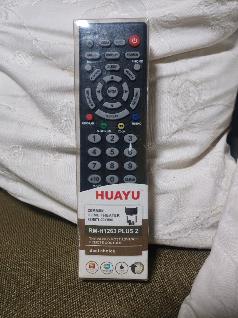 HUAYU RM-H1263 PLUS 2 Home Theater Remote Control (Category: TV Parts & Accessories) located in Trece Martires City. Submitted by chipmaster74 (Listing ID 1466780709, Image 1). Description: - Model: HUAYU RM-H1263 PLUS 2 Home Theater Universal Remote - Condition: Like new, and still in original plastic sleeve. Tried only once. - Setup: Universal setup with easy code input instructions printed directly on the back - Design: Classic black body feat