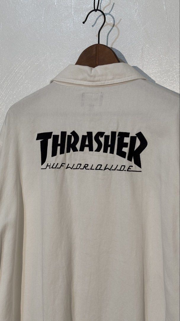 HUF x Thrasher White Long Sleeve Work Jacket XXL (Category: Coats, Jackets and Outerwear) located in Manila. Submitted by glano (Listing ID 1466917252, Image 1). Description: - Brand: HUF x Thrasher - Condition: Brand new with original store hangtag attached - Size: XXL - Color: White - Design: Button-up front, fold-over collar, and button cuffs - Pockets: Multiple utility pockets on the chest and lower front - Branding: Small woven globe patch o
