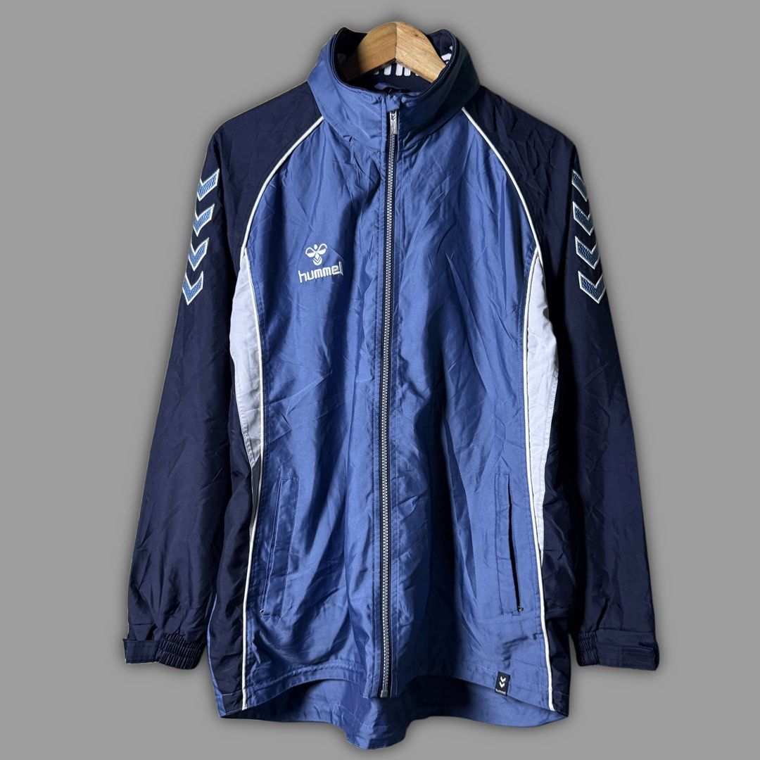 HUMMEL TRACK WINDBREAKER (Category: Coats, Jackets and Outerwear) located in Zamboanga. Submitted by hype_thrifts (Listing ID 1466862333, Image 1). Description: HUMMEL VINTAGE FULL-ZIP TRACK WINDBREAKER - XL Width: 24 Length: 27-30 Excellent condition -.