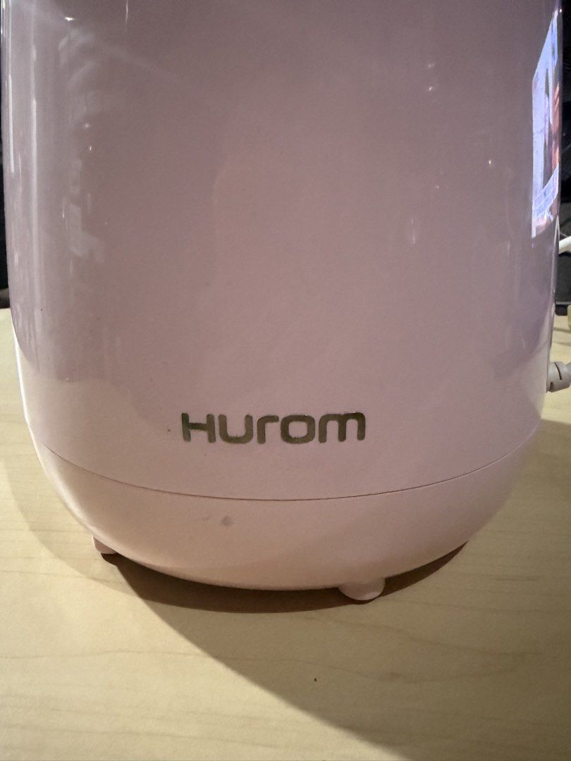 Hurom Slow Juicer (Category: Juicers, Blenders & Grinders) located in Bulacan. Submitted by mysticdeer.6d7f47 (Listing ID 1466885230, Image 2). Description: The image shows a Hurom HP Slow Juicer (model HP-PWF12 / HP-PWF12A) in a pink finish..
