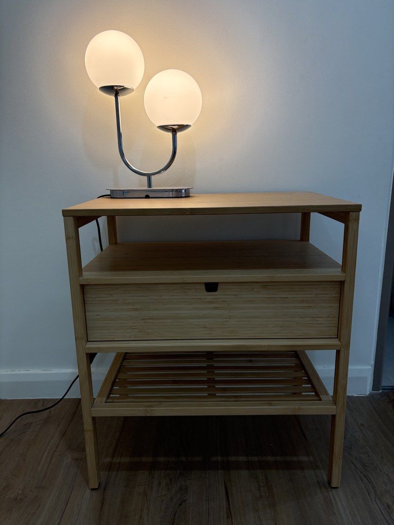 IKEA bamboo bedside table (Category: Shelves, Cabinets & Racks) located in Quezon City. Submitted by emmakne (Listing ID 1466824566, Image 1). Description: Ikea bedside table. Made of bamboo with one drawer. Selling because we are moving..