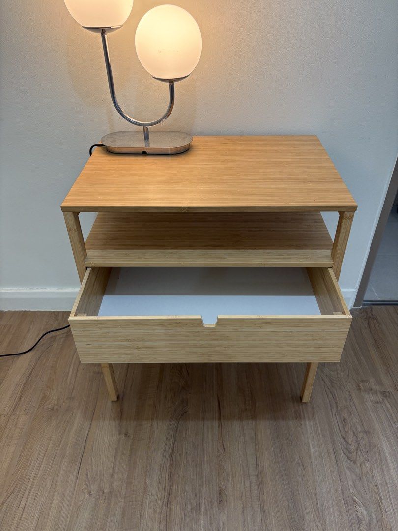 IKEA bamboo bedside table (Category: Shelves, Cabinets & Racks) located in Quezon City. Submitted by emmakne (Listing ID 1466824566, Image 2). Description: Ikea bedside table. Made of bamboo with one drawer. Selling because we are moving..