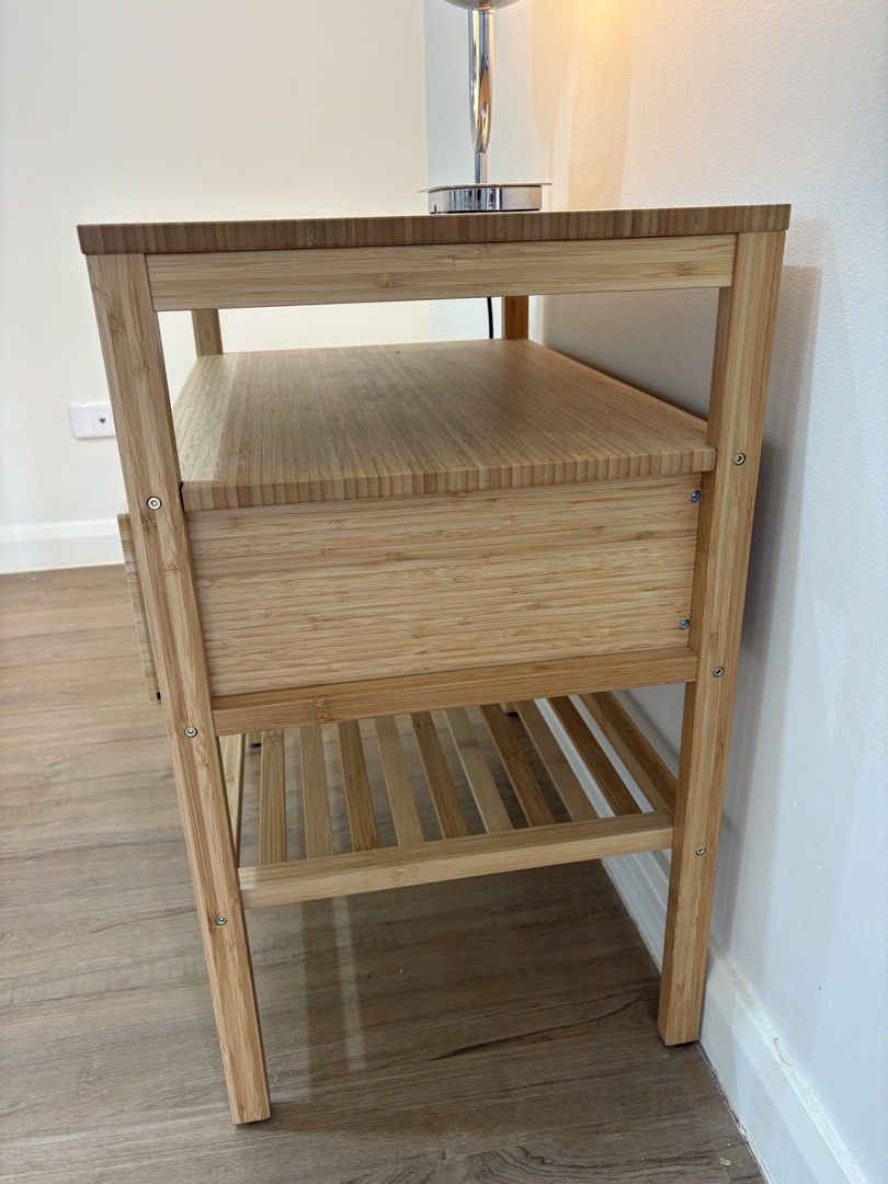 IKEA bamboo bedside table (Category: Shelves, Cabinets & Racks) located in Quezon City. Submitted by emmakne (Listing ID 1466824566, Image 3). Description: Ikea bedside table. Made of bamboo with one drawer. Selling because we are moving..