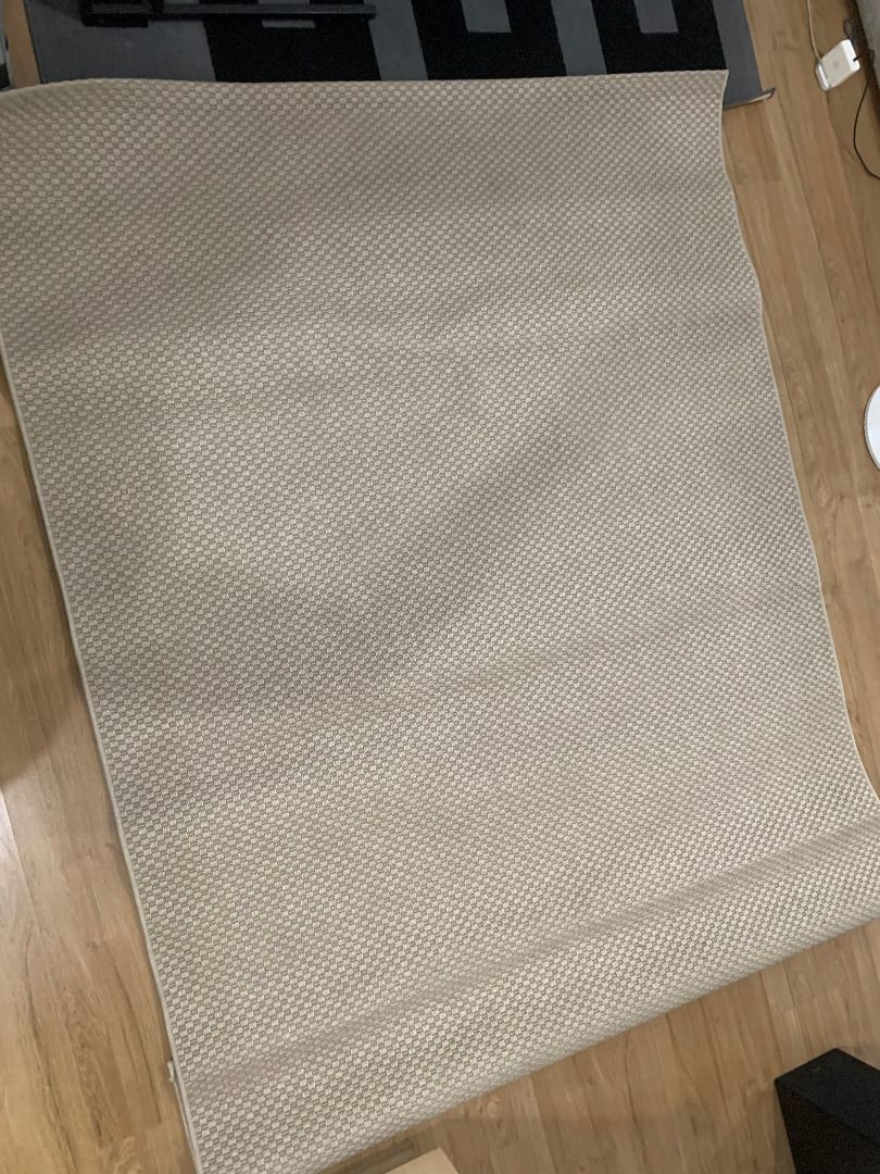 IKEA beige patterned area rug (Category: Carpets, Mats & Flooring) located in Taguig. Submitted by mrtee155 (Listing ID 1466778851, Image 2). Description: - Large area rug featuring a subtle woven geometric pattern - Versatile neutral beige and grey tones that match any living room or bedroom - Durable, textured surface that feels great underfoot - Designed to lay flat easily on hardwood floors - Clean, finished edges all around .