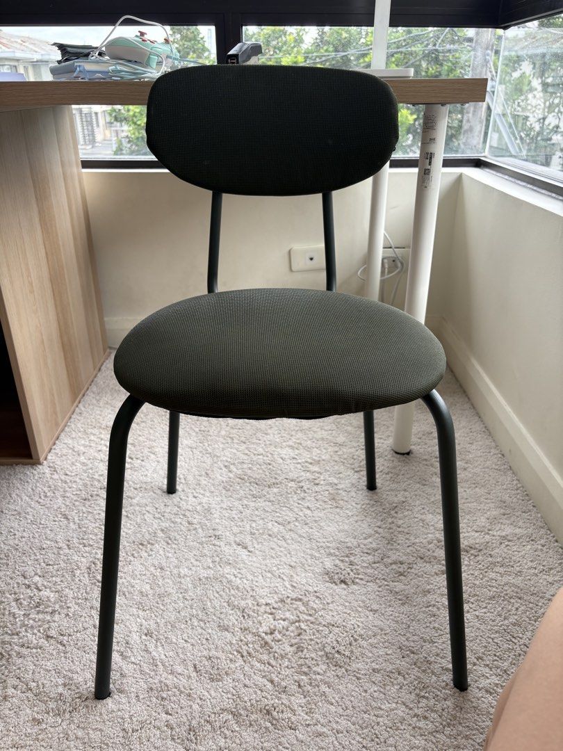 IKEA Green Chair (Category: Chairs) located in Quezon City. Submitted by emmakne (Listing ID 1466823745, Image 1). Description: IKEA green chair can be used as an office chair or dining chair. The bottom piece of one of the legs fell off but it is not wobbly..