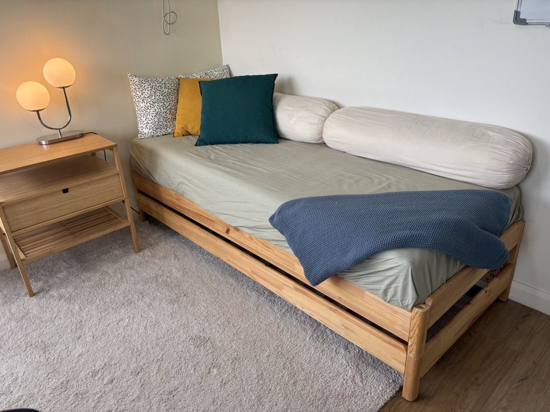 IKEA Stackable Bed Frame and Mattresses (Category: Bed Frames & Mattresses) located in Quezon City. Submitted by emmakne (Listing ID 1466819722, Image 1). Description: Stackable bed from IKEA. Can come with all pillows and bedding pictured. Beds can be stacked to become twin size. Beds can be separated to become two twin beds or one full size bed. There is one broken slat but it is still comfortable to sit/sleep on. We purchased new slats to repl