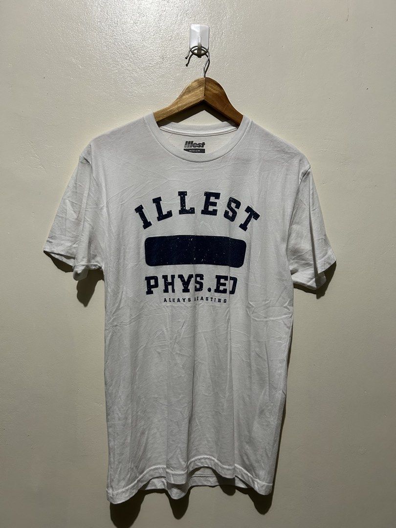 Illest Phys. Ed White T-Shirt Medium (Category: Tshirts & Polo Shirts ) located in Angeles City. Submitted by johngamboa (Listing ID 1466962222, Image 1). Description: - Brand/Style: White Illest Phys. Ed graphic t-shirt - Design: Navy blue distressed lettering on the chest with "always beasting" slogan - Size: Medium (tag on inner collar) - Material: 100% cotton, comfortable for daily wear - Fit/Cut: Crew neck, short sleeves - Vibe: Easy everyda