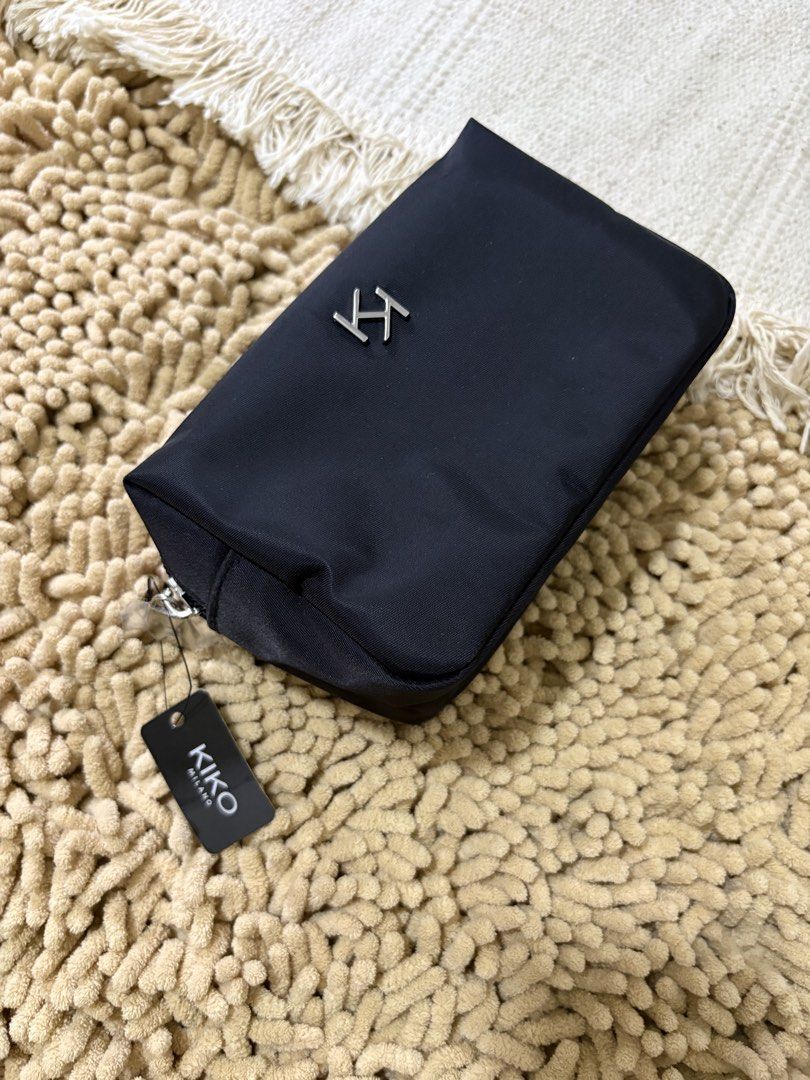 Imported KIKO Milano black pouch (Category: Purses & Pouches) located in Quezon City. Submitted by heartshop.ph (Listing ID 1466793540, Image 1). Description: Super nice Nylon with metal hardwares.