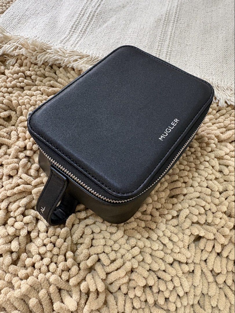 Imported Mugler x Loreal Paris Cosmetic Purse box type (Category: Purses & Pouches) located in Quezon City. Submitted by heartshop.ph (Listing ID 1466856528, Image 1). Description: Original Cosmetic Purse.