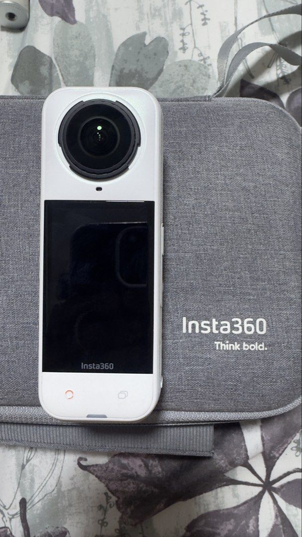Insta360 X5 camera with case and accessories bundle (Category: Cameras) located in Dasmarinas. Submitted by JD1997 (Listing ID 1466778393, Image 1). Description: - Complete Insta360 X5 action camera bundle - Includes gray zip carrying case and charging accessories - Comes with spare battery housing - Variety of selfie sticks, tripod stand, and neck mount harness with thumbscrews included - Sold as one complete set, ready for your next trip or fil