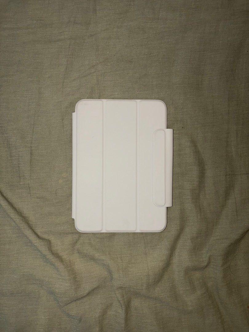iPad mini 6 folio case (Category: Cases & Sleeves) located in Makati City. Submitted by paulsellsstuff (Listing ID 1466872852, Image 1). Description: - Compatible Model: iPad mini 6 - Type: Folio case / cover - Color: White - Condition: Layered condition 6 (well-maintained, clean) - Features: Foldable stand design for easy viewing and typing - Meetup Location: Power Plant Mall, Makati City.