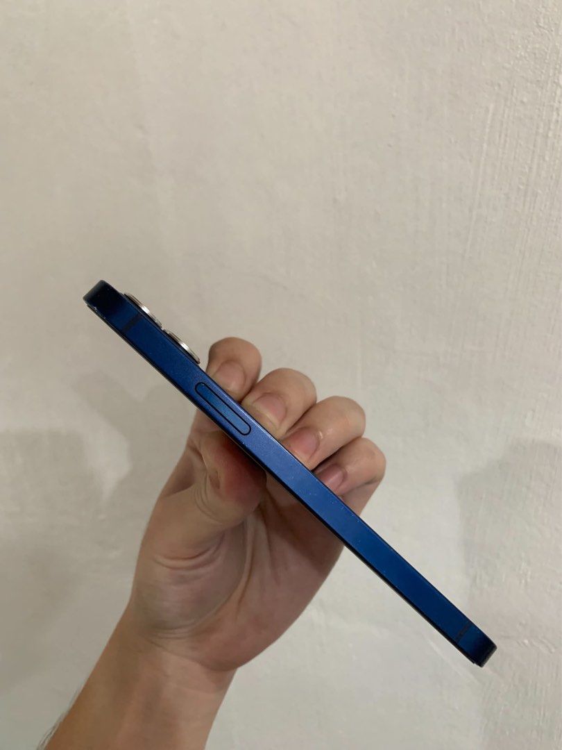 Iphone 12 128GB Blue (Category: iPhone 12 Series) located in Manila. Submitted by pauloreynoso (Listing ID 1466902688, Image 3). Description: For Sale Only - Iphone 12 128GB Quick Description: No Sim Restrictions (All sim pwede) 5G ready!✅ Battery Health - 75% (Original battery) IOS Version: 18.7.8 (Much stable than newer IOS version but depends on you if you would like to update to IOS27) Everything is WORKING NO REPAIR HISTORY EVERYTHING IS ORI