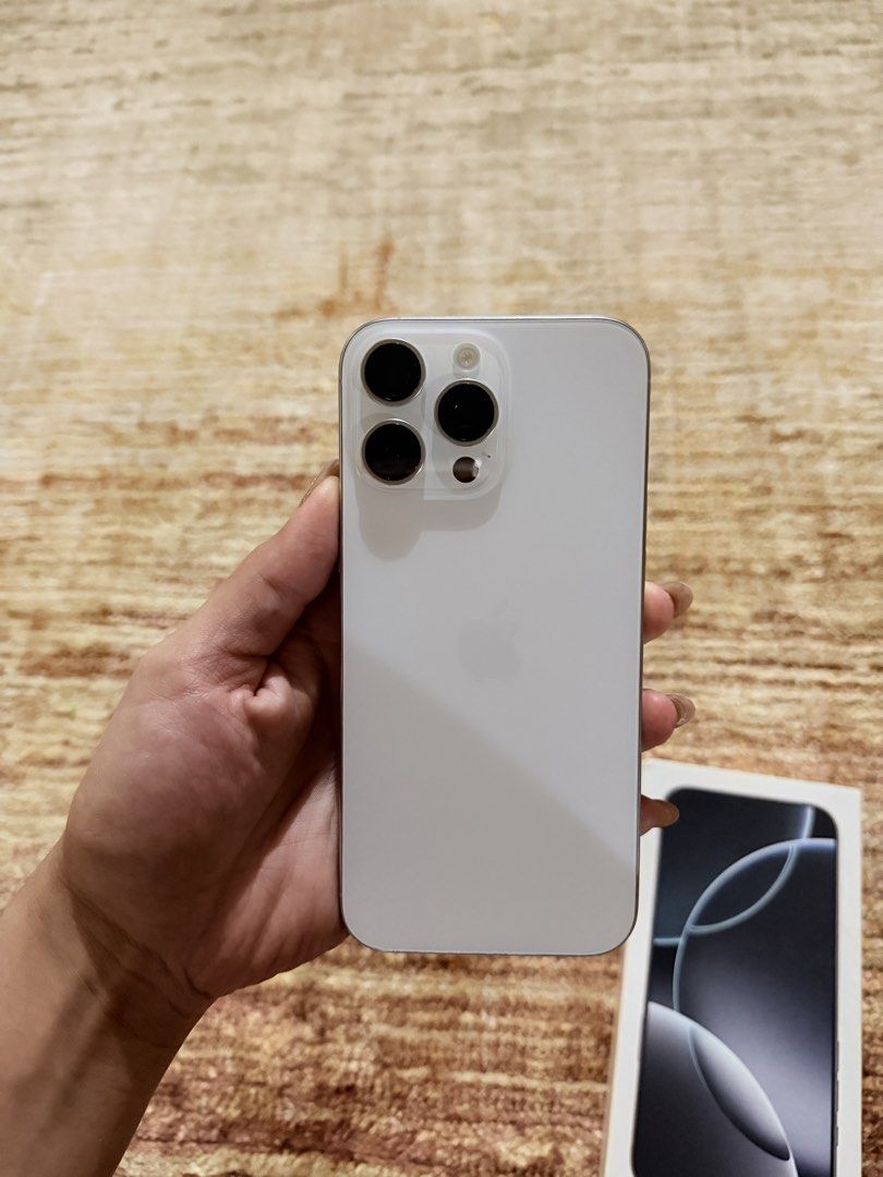 Iphone 16 Pro Max 512 GB Titanium White (Category: iPhone 16 Series) located in Quezon City. Submitted by marellaptrc (Listing ID 1466847672, Image 2). Description: Iphone 16 Promax 512 GB 90% battery health; Smartlocked Titanium White Issue: Hairline crack sa screen pwede ipa-reglass.