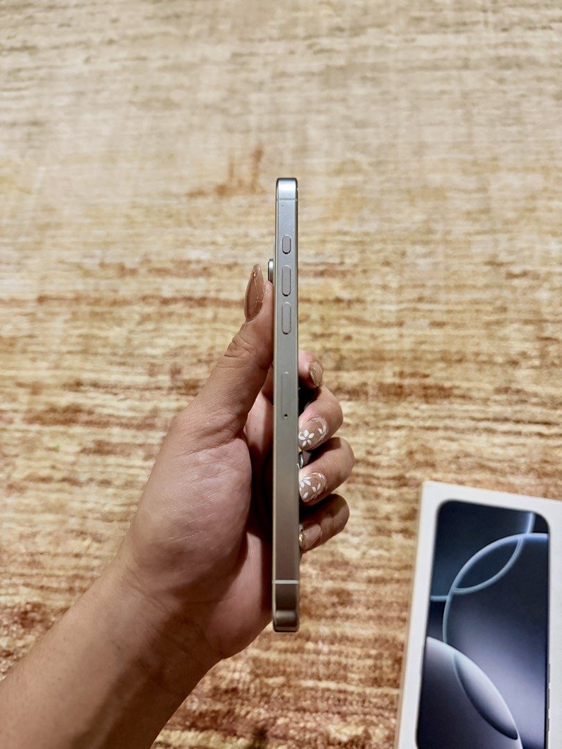 Iphone 16 Pro Max 512 GB Titanium White (Category: iPhone 16 Series) located in Quezon City. Submitted by marellaptrc (Listing ID 1466847672, Image 3). Description: Iphone 16 Promax 512 GB 90% battery health; Smartlocked Titanium White Issue: Hairline crack sa screen pwede ipa-reglass.