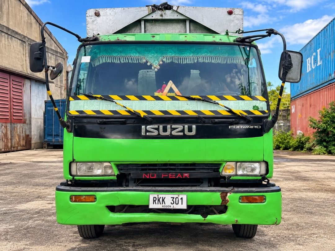 Isuzu Forward Manual (Category: Used Cars) located in Caloocan City. Submitted by trucklistinginquiries (Listing ID 1466829698, Image 3). Description: 1995 ISUZU FORWARD 6-WHEELER WING VAN Price: 450000 Negotiable Location: Liloan, Cebu -7,127cc / 7.1L, 6-cylinder diesel -Manual transmission -Aluminum wing van cargo body -Green | Plate RKK301 -New batteries; engine starts -Both wings open -ORIX fully paid CONDITION: Used, selling as-is. Steering 