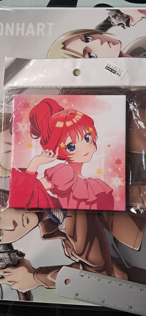 Itsuki Nakano Square Canvas Art Wall Decor (Category: Character Goods) located in Manila. Submitted by mooncollectibles_000a43 (Listing ID 1466831011, Image 1). Description: - Design: Red-haired anime female in a pink dress against a snowy background - Material: Textured canvas print with a sturdy black plastic backing frame - Features: Built-in hanging slots on the back for easy mounting - Condition: Brand new.