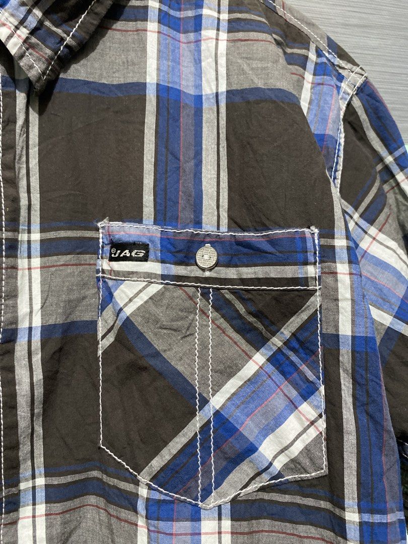 JAG Jeans Plaid Short Sleeve Button Down Shirt (Category: Activewear) located in Butuan. Submitted by nielben13 (Listing ID 1466849494, Image 3). Description: - Brand: JAG Jeans - Style: Short-sleeve button-down shirt - Design: Brown, blue, white, and grey plaid pattern - Material: 100% cotton for all-day comfort - Features: Standard collar, two front chest pockets with button flaps and contrast stitching - Bonus: Extra spare button attached insi
