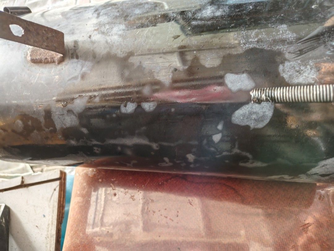 Jasma muffler (Category: Mufflers and Exhaust Parts and Accessories) located in Muntinlupa City. Submitted by jojiepogi123 (Listing ID 1466818136, Image 3). Description: - Brand: Jasma / Fujitsubo Giken (Main Factory) - Item Type: Exhaust muffler canister - Finish: Smoked/burnt-tip design - Condition: Used, good structural condition with visible signs of previous use - Ideal for custom car exhaust upgrades.
