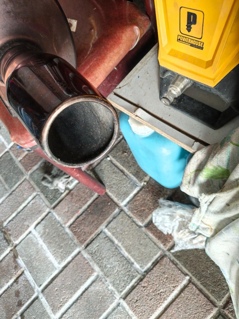 Jasma muffler (Category: Mufflers and Exhaust Parts and Accessories) located in Muntinlupa City. Submitted by jojiepogi123 (Listing ID 1466818136, Image 2). Description: - Brand: Jasma / Fujitsubo Giken (Main Factory) - Item Type: Exhaust muffler canister - Finish: Smoked/burnt-tip design - Condition: Used, good structural condition with visible signs of previous use - Ideal for custom car exhaust upgrades.