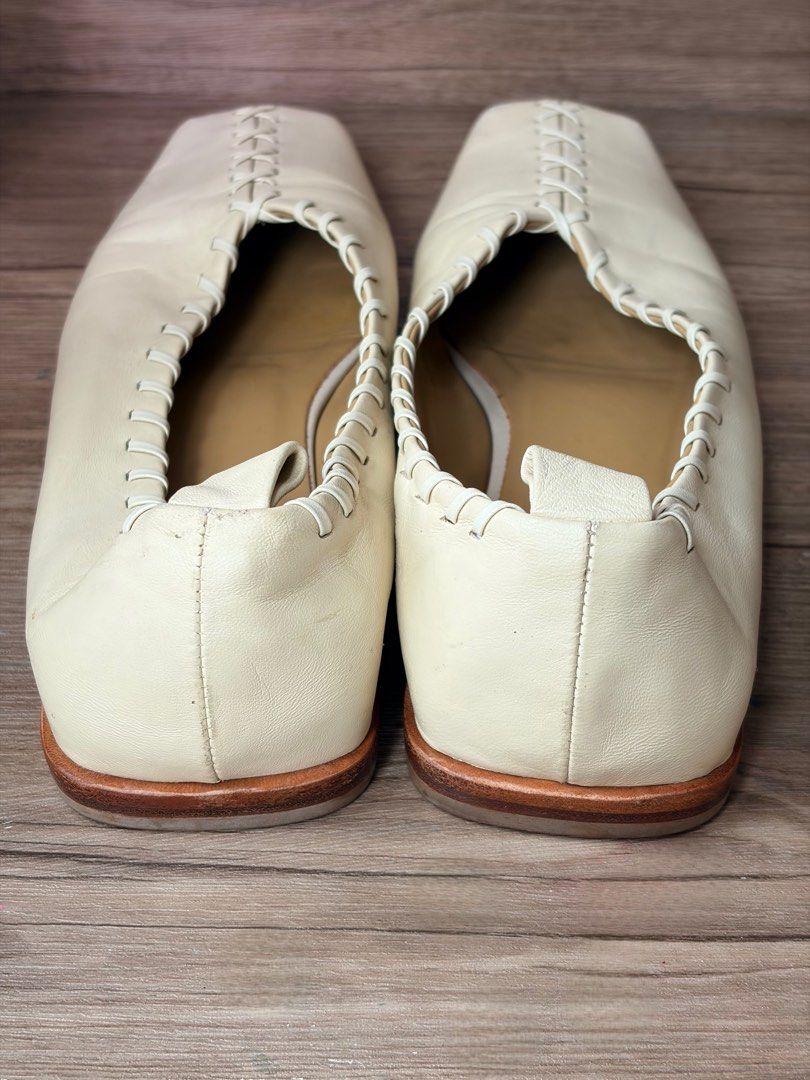 Jil Sander Cream Leather Square Toe Loafers (Category: Loafers) located in Manila. Submitted by ladybagmnl (Listing ID 1466782904, Image 2). Description: The ultimate Quiet Luxury / Minimalist staple piece! Retails for over ₱35,000+ brand new. Brand: Jil Sander Item: Cream Leather Whipstitch Slip-On Shoes Size: 37 (Fits true to size) 23.5cm Color: Cream with contrast white whipstitch detailing and tan interior Material: Premium Italian leather (s