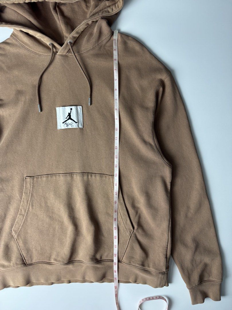 Jordan Flight Brown Hoodie (Category: Coats, Jackets and Outerwear) located in Cavite. Submitted by dracokidstuff (Listing ID 1466874030, Image 3). Description: - Authentic Jordan Flight hoodie in versatile brown - Heavyweight cotton fleece fabric for maximum warmth - Classic kangaroo pocket and drawstring hood with metal aglets - Distinct white Jumpman patch stitched on the chest - Clean cuffs and hem with minor seam fading for a stylish vintage