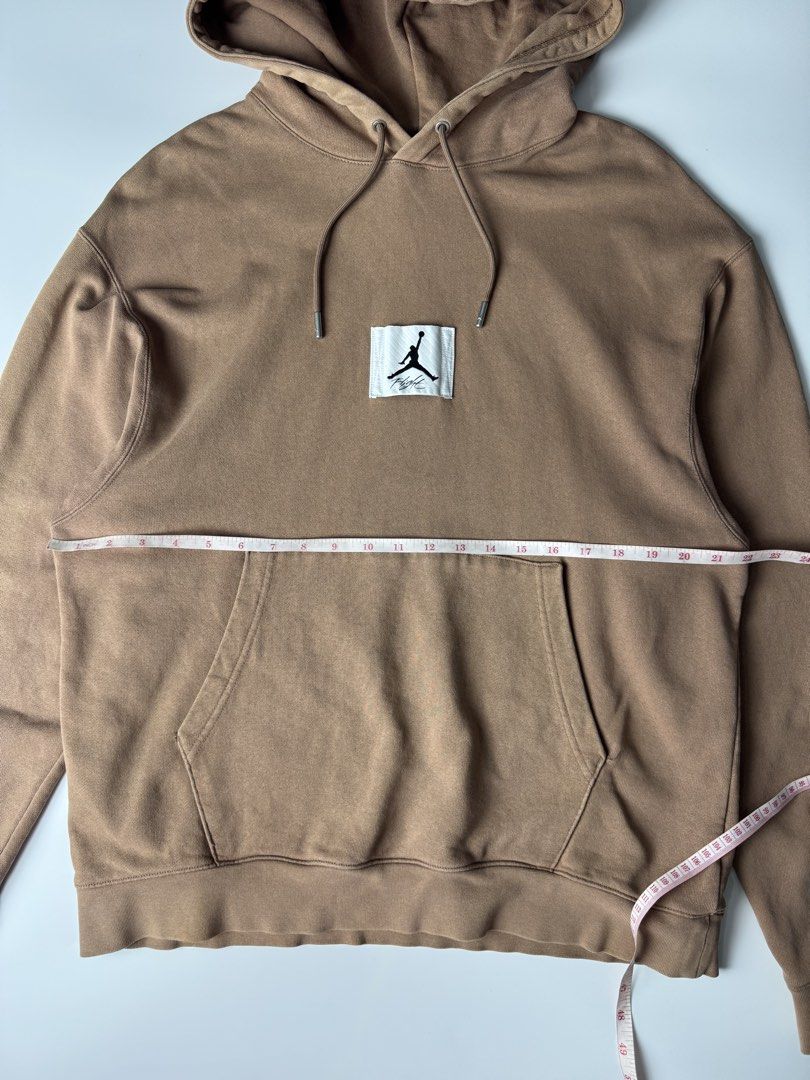 Jordan Flight Brown Hoodie (Category: Coats, Jackets and Outerwear) located in Cavite. Submitted by dracokidstuff (Listing ID 1466874030, Image 2). Description: - Authentic Jordan Flight hoodie in versatile brown - Heavyweight cotton fleece fabric for maximum warmth - Classic kangaroo pocket and drawstring hood with metal aglets - Distinct white Jumpman patch stitched on the chest - Clean cuffs and hem with minor seam fading for a stylish vintage