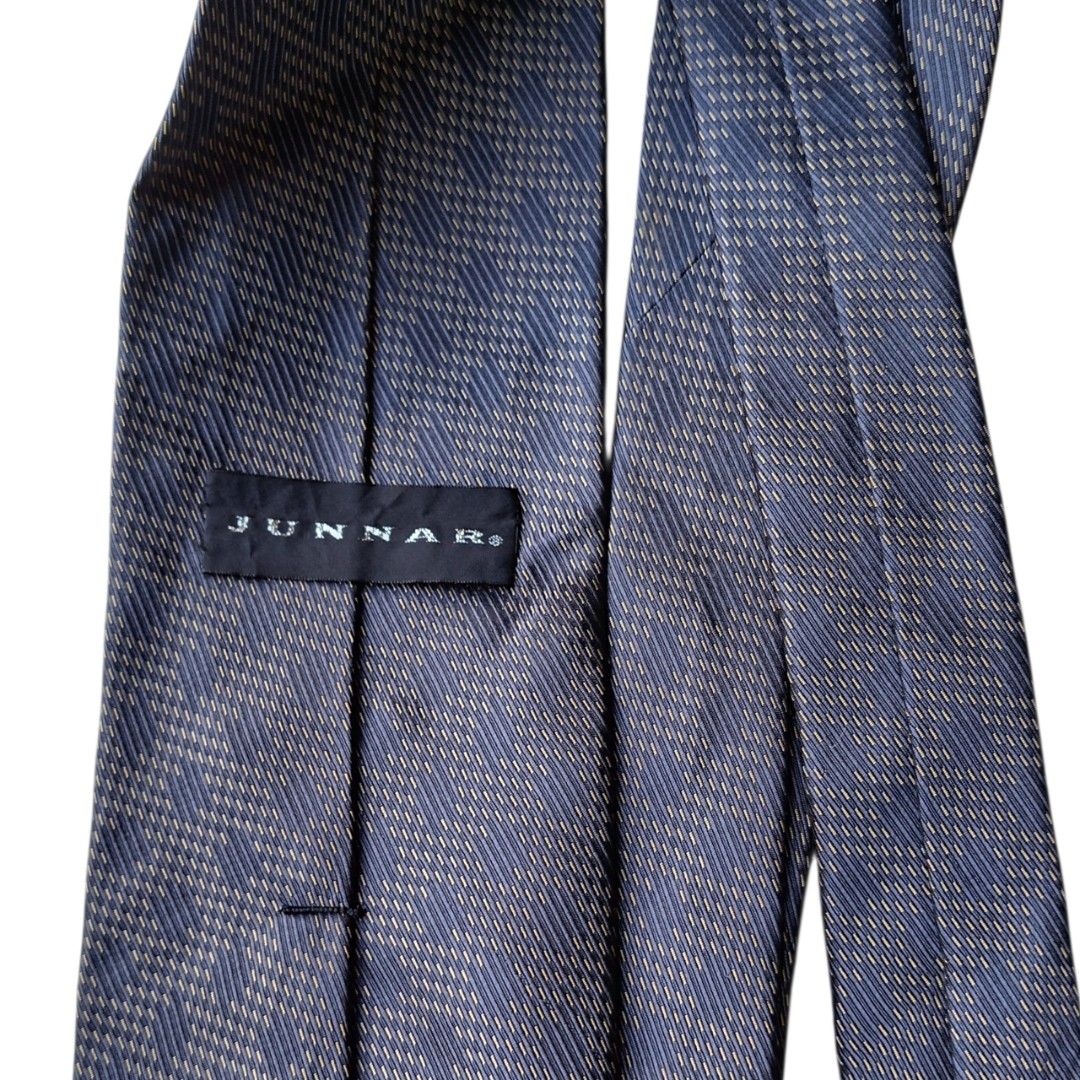 Junnar Navy Textured Micro-Dash Pattern Neck tie (Category: Ties) located in Abucay. Submitted by gibzzz123 (Listing ID 1466814406, Image 3). Description: • All items are ON HAND and ready to be shipped/picked up. • Items are preloved/ukay, so please expect minimal signs of usage unless stated otherwise. • No major issues — good condition unless otherwise indicated in the listing. • Actual color may slightly vary due to lighting and screen settin