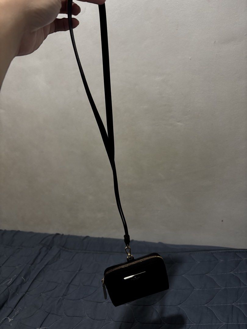 Kate Spade Carter Card Case Lanyard (Category: Wallets & Card holders) located in Manila. Submitted by declutter_byjaq (Listing ID 1466937752, Image 2). Description: KATE SPADE CARTER CARD CASE LANYARD Details: Brand: Kate Spade Style: Carter Card Case Lanyard Color: Black Condition: Brand New With Tag Classy, sleek, and perfect for everyday use! A cute and practical accessory for your cards and essentials. 🥰.