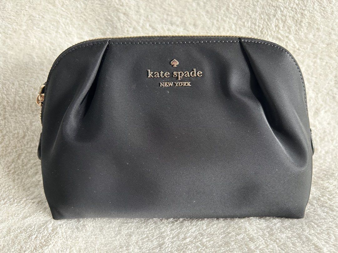 Kate spade pouch (Category: Luxury Bags & Wallets) located in Baguio. Submitted by previouslymine.10 (Listing ID 1466857875, Image 1). Description: - never used.