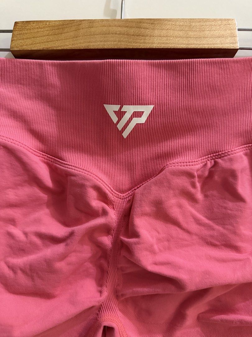 KeepThatPump Pink Gym Shorts Ruched Butt Size M (Category: Activewear) located in Makati City. Submitted by lvshop_mnl (Listing ID 1466835890, Image 3). Description: - Brand: KeepThatPump - Color: Bright Pink - Size: Medium - Material: 90% Nylon, 10% Elastane (Super stretchy) - Features: Ribbed high waistband and flattering back ruching - Details: White brand logo near the top back - Condition: Great for workouts and activewear.