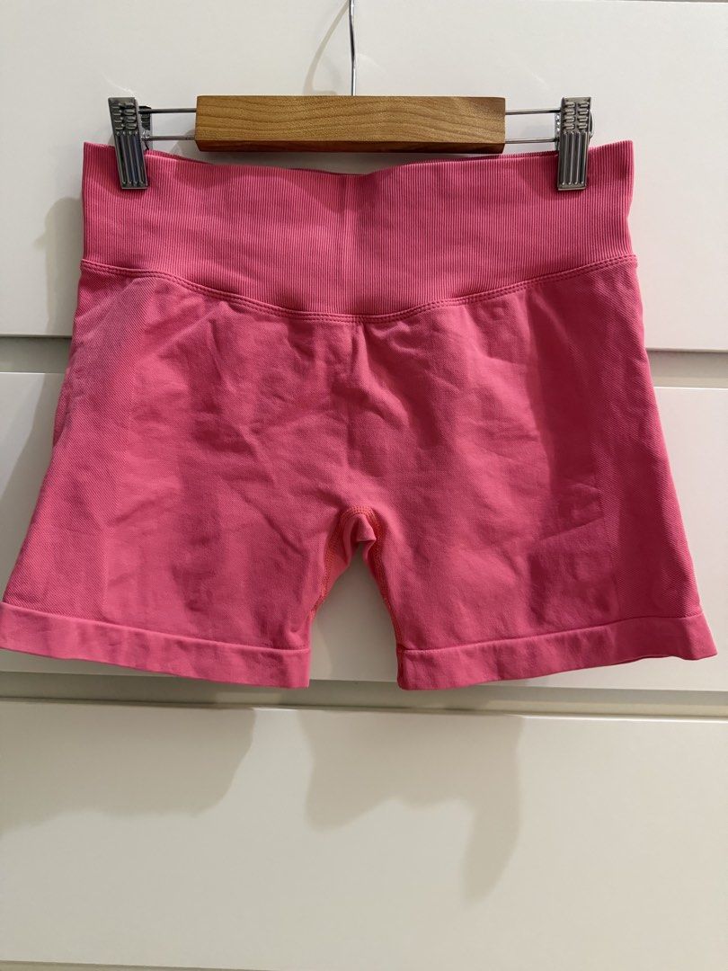 KeepThatPump Pink Gym Shorts Ruched Butt Size M (Category: Activewear) located in Makati City. Submitted by lvshop_mnl (Listing ID 1466835890, Image 1). Description: - Brand: KeepThatPump - Color: Bright Pink - Size: Medium - Material: 90% Nylon, 10% Elastane (Super stretchy) - Features: Ribbed high waistband and flattering back ruching - Details: White brand logo near the top back - Condition: Great for workouts and activewear.