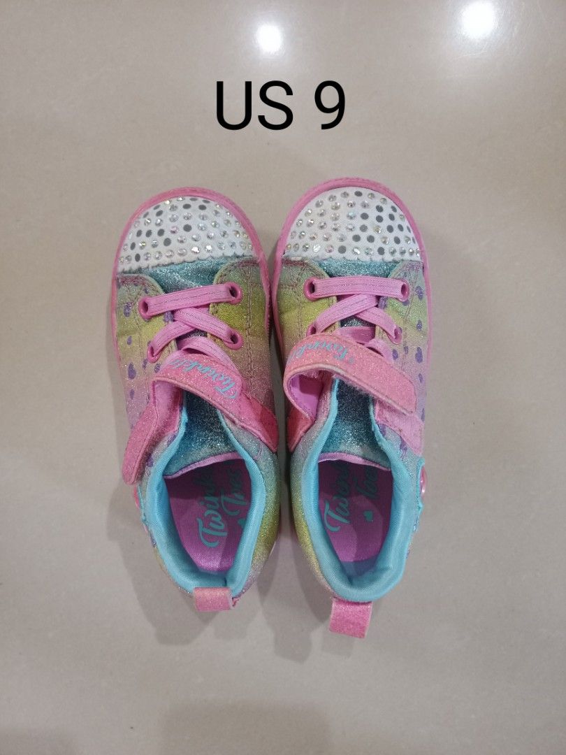 Kids Shoes US 9-10 take all (Category: Babies & Kids Fashion) located in Manila. Submitted by coolmoon.6a41a1 (Listing ID 1466791306, Image 1). Description: - Brand: Skechers Twinkle Toes - Size: US 9 - Design: Colorful pastel rainbow glitter with sparkly rhinestone toe caps - Closure: Easy pink hook-and-loop strap over elastic laces - Sole: Durable pink rubber with fun heart patterns underneath - Condition/Usage: Great everyday sneakers for kids