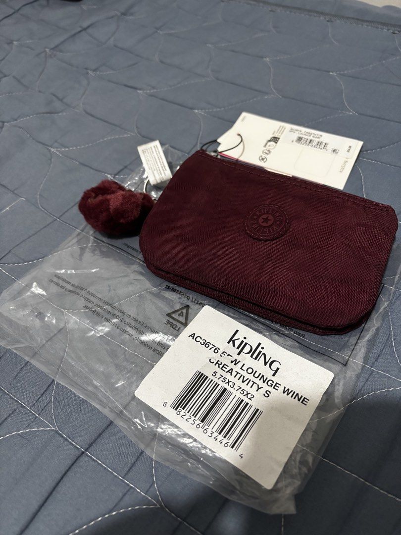 Kipling Small Creativity (Category: Wallets & Card holders) located in Manila. Submitted by declutter_byjaq (Listing ID 1466934611, Image 1). Description: Kipling Small Creativity Color: Lounge Wine Brandnew.