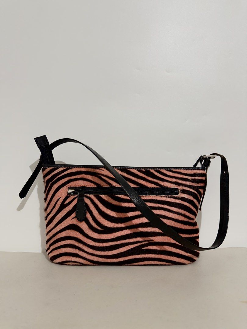 Kitamura zebra-print calf hair (Category: Shoulder Bags) located in Manila. Submitted by coachiqueclosetbysuei_3rdaccnt (Listing ID 1466941049, Image 2). Description: 💫 Kitamura zebra-print calf hair 💫 𝐒𝐨𝐮𝐫𝐜𝐞: Japan🇯🇵 💫 𝐈𝐬𝐬𝐮𝐞: None 💫 𝐂𝐨𝐧𝐝𝐢𝐭𝐢𝐨𝐧: 10/10 Excellent Condition 💫 𝐎𝐭𝐡𝐞𝐫𝐬: Structured Kili Bag 💫 The color may vary due to lighting 💫 What you see is what you get ——————𝓜𝓾𝓼𝓽 𝓡𝓮𝓪𝓭!——————— 📍 𝐋𝐨𝐜𝐚𝐭�