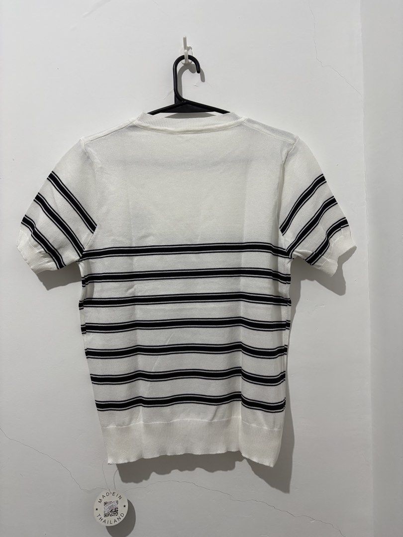 Knit Top and Pants Set White Black Stripe (Category: Sets or Coordinates) located in Manila. Submitted by coolphoenix_f1e702 (Listing ID 1466862253, Image 2). Description: - Matching knit outfit: white short-sleeve top and solid black pants - Top features trendy horizontal black stripes and embroidered chest logo - Designed with ribbed cuffs and hems for a snug fit - Crafted from comfortable stretch fabric for all-day ease - Versatile pieces that