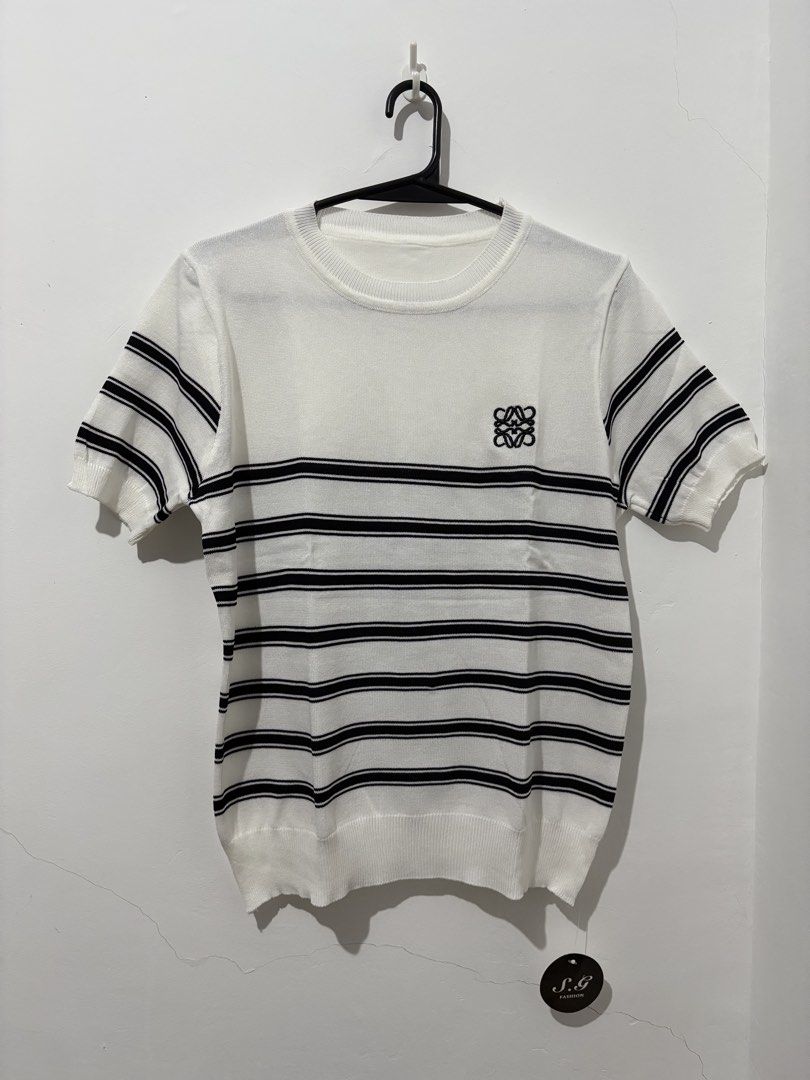 Knit Top and Pants Set White Black Stripe (Category: Sets or Coordinates) located in Manila. Submitted by coolphoenix_f1e702 (Listing ID 1466862253, Image 1). Description: - Matching knit outfit: white short-sleeve top and solid black pants - Top features trendy horizontal black stripes and embroidered chest logo - Designed with ribbed cuffs and hems for a snug fit - Crafted from comfortable stretch fabric for all-day ease - Versatile pieces that