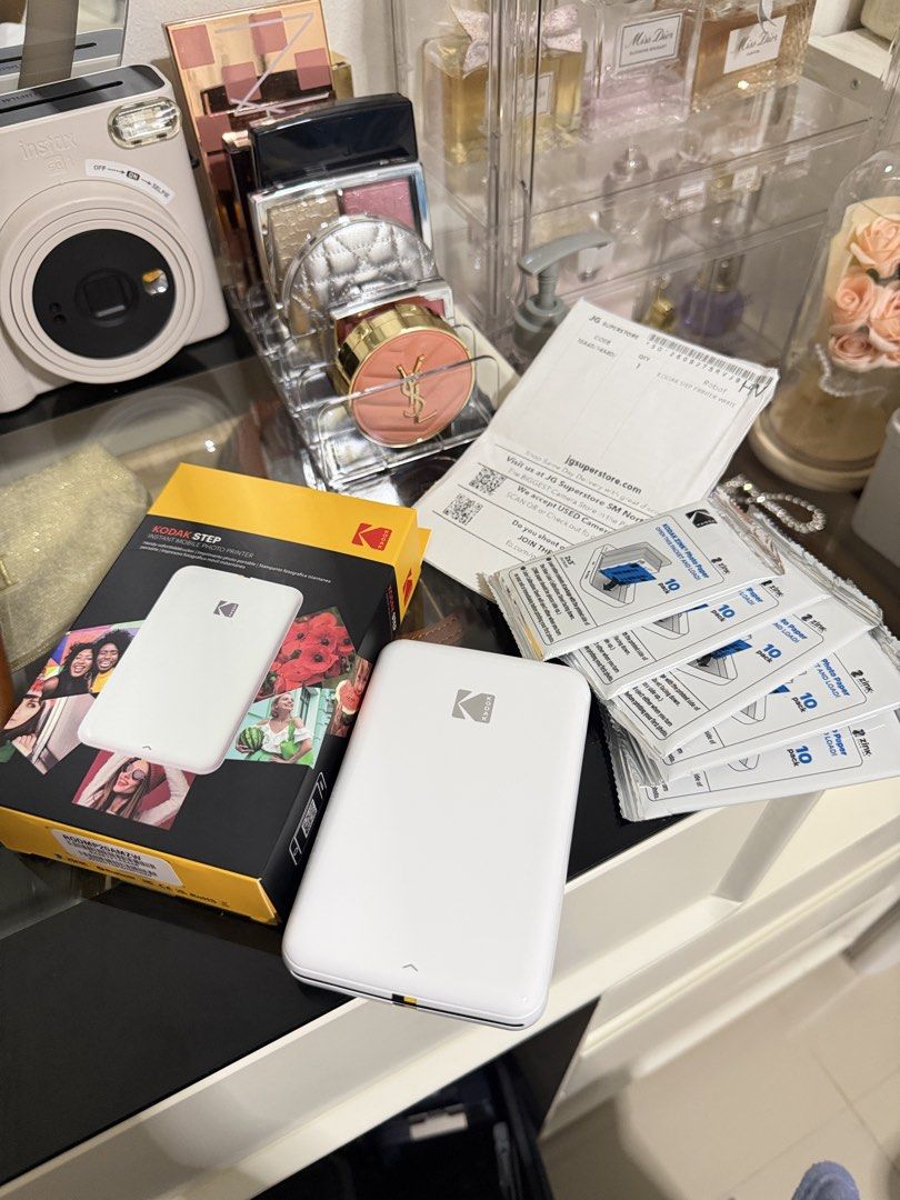 Kodak Step Photo Printer (Category: Printers, Scanners & Copiers) located in Pateros City. Submitted by stormi11 (Listing ID 1466960160, Image 1). Description: Just bought it but upgrade agad sa Canon Selphy ☺️ Selling it with box and receipt. Once ko lang nagamit, isama ko na din yun 50pcs Photo Paper na binili ko seperate Bought the kodak PHP 4,687 Photo Paper 1,318 Sept 29 ko lang nabili .