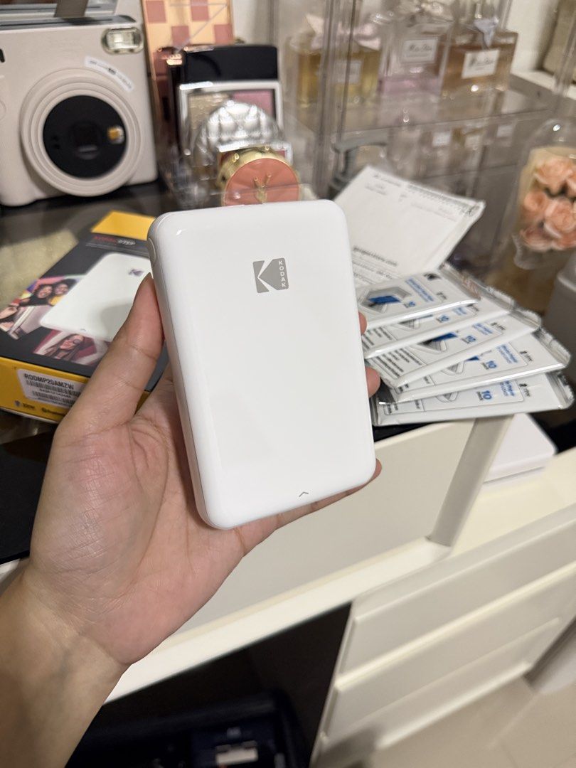 Kodak Step Photo Printer (Category: Printers, Scanners & Copiers) located in Pateros City. Submitted by stormi11 (Listing ID 1466960160, Image 2). Description: Just bought it but upgrade agad sa Canon Selphy ☺️ Selling it with box and receipt. Once ko lang nagamit, isama ko na din yun 50pcs Photo Paper na binili ko seperate Bought the kodak PHP 4,687 Photo Paper 1,318 Sept 29 ko lang nabili .