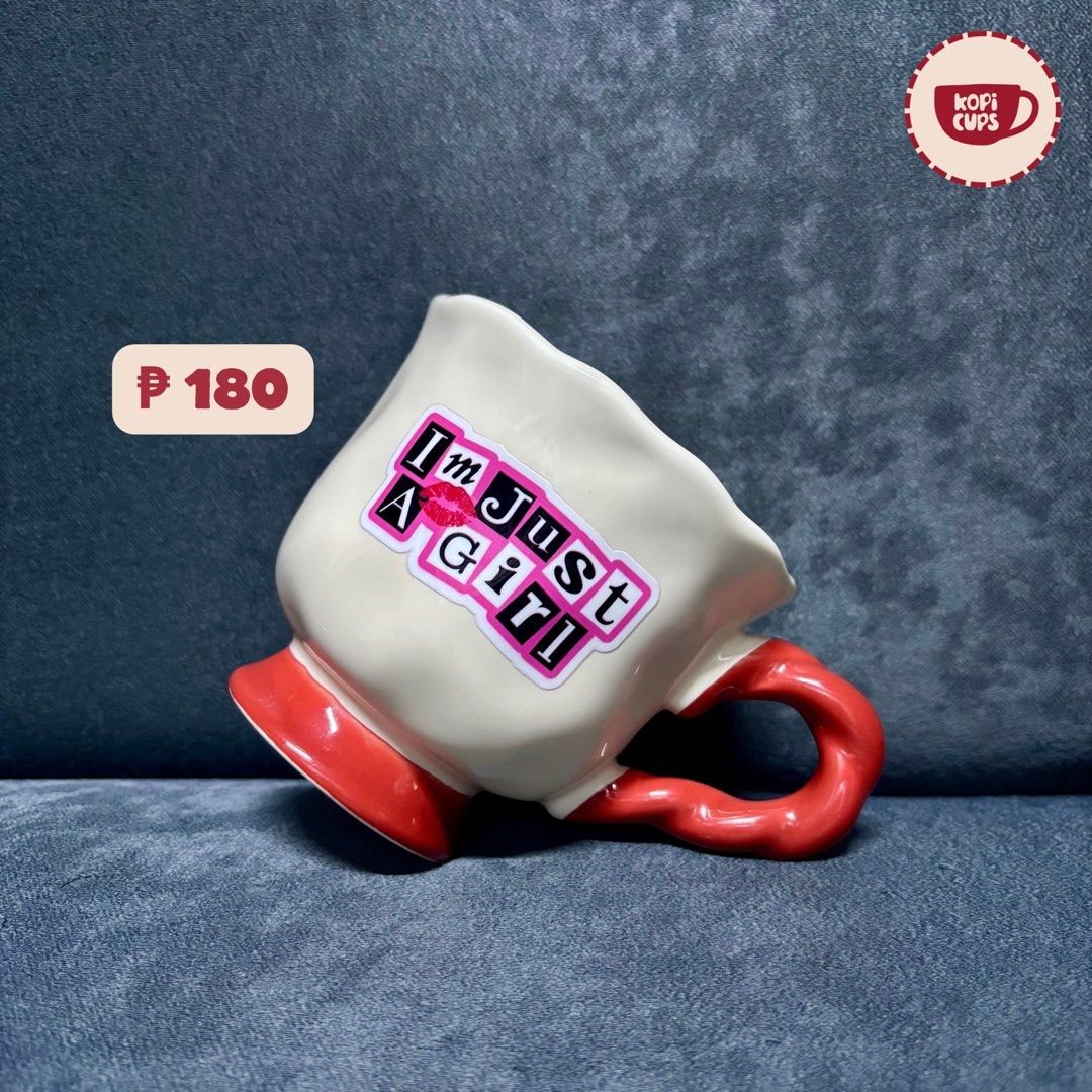 Kopi Cups Cute Ceramic Mug Red Cream (Category: Coffee & Tea Tableware) located in General Trias. Submitted by dddddaph (Listing ID 1466832577, Image 1). Description: - Color: Cream body with vibrant red handle and base LOCATION: General Trias City, Cavite MOD: Lalamove/ J&T 📌 Please Read Before Ordering: * These are factory pull-out mugs, so minor imperfections may be present. * Rest assured that any noticeable flaws, such as cracks or chips, w