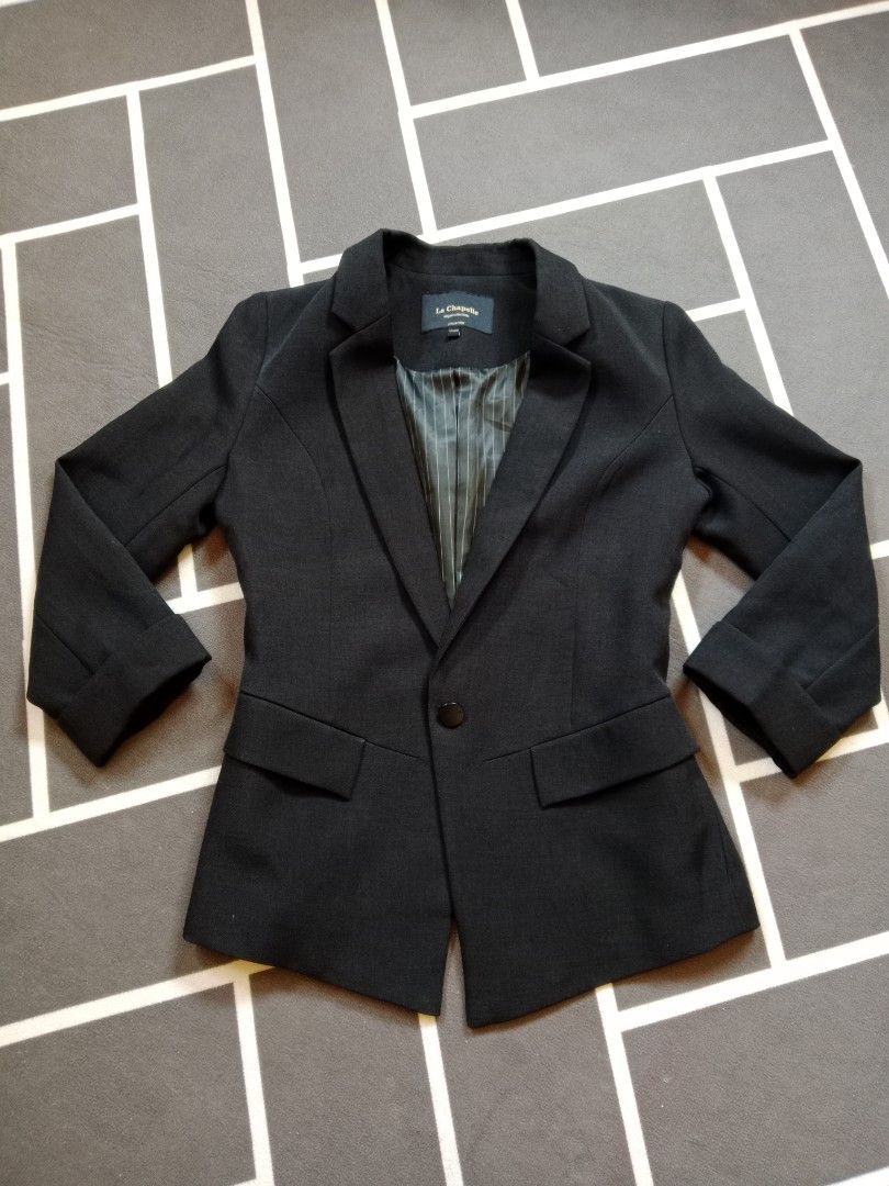 La Chapelle Black Blazer Jacket Size 155/80A (Category: Coats, Jackets and Outerwear) located in Baguio. Submitted by jooeeeyyyy_ (Listing ID 1466810196, Image 1). Description: - Brand: La Chapelle - Size: 155/80A - Color: Classic Black - Closure: Single-button front with branded hardware - Interior: Stylish striped satin lining - Features: Structured fit with functional hip flap pockets - Condition: Pristine, clean fabric inside and out.