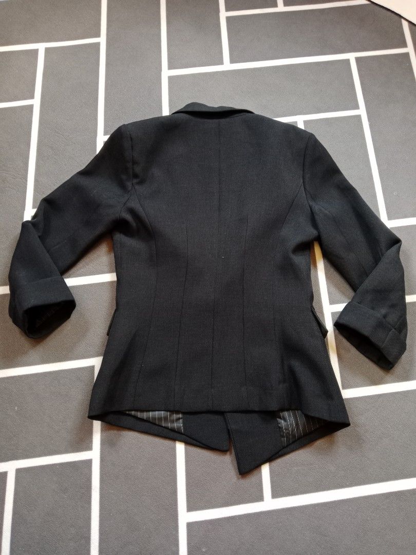La Chapelle Black Blazer Jacket Size 155/80A (Category: Coats, Jackets and Outerwear) located in Baguio. Submitted by jooeeeyyyy_ (Listing ID 1466810196, Image 2). Description: - Brand: La Chapelle - Size: 155/80A - Color: Classic Black - Closure: Single-button front with branded hardware - Interior: Stylish striped satin lining - Features: Structured fit with functional hip flap pockets - Condition: Pristine, clean fabric inside and out.