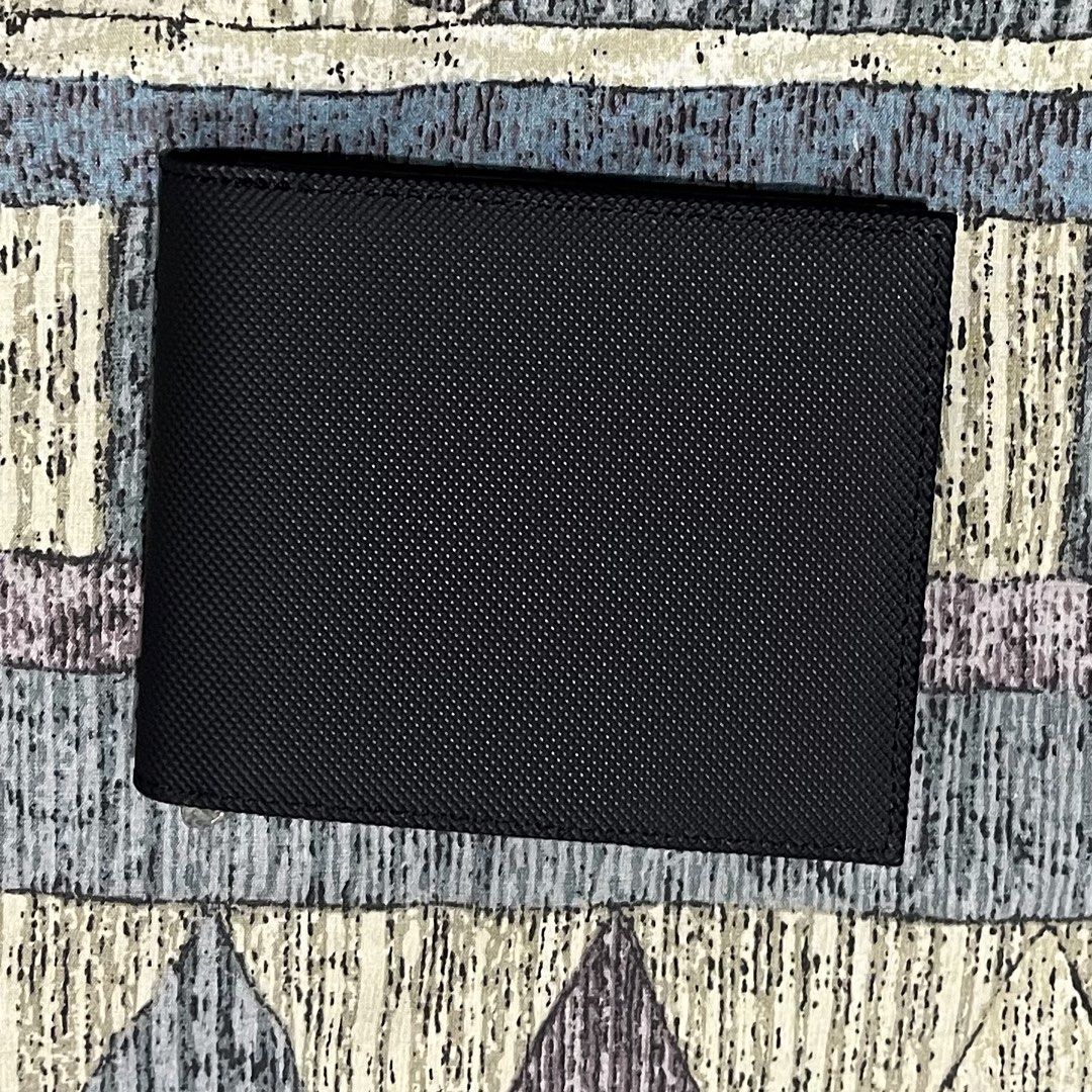 SALE !!! Lacoste Bi-Fold Black Wallet (Category: Wallets & Card Holders) located in Quezon City. Submitted by jpsstore (Listing ID 1466883418, Image 3). Description: Lacoste Bi-Fold Black Wallet With box No issue MOP: Gcash SHIPPING: J&t | Lalamove .