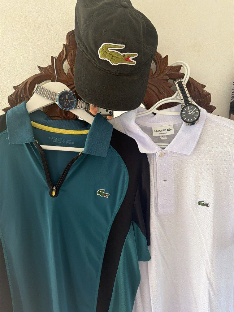 Lacoste Bundle Polo Shirts Hat Watches (Category: Tshirts & Polo Shirts ) located in Cabuyao City. Submitted by crmnmlvn34389 (Listing ID 1466788485, Image 1). Description: - 1x Green and black quarter-zip sports polo - 1x Classic white cotton polo shirt - 1x Dark cap featuring a large signature green crocodile logo - 2x Lacoste wristwatches - Great value bundle, perfect for gifting or upgrading your wardrobe - Fast shipping and reliable seller -