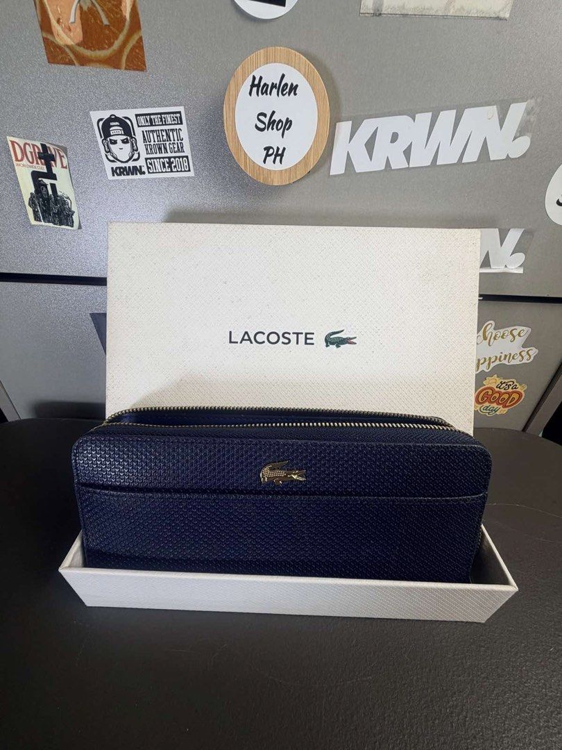 Lacoste women’s long blue wallet (Category: Wallets & Card holders) located in Manila. Submitted by harveybirosel (Listing ID 1466791813, Image 1). Description: Lacoste women’s long blue wallet.