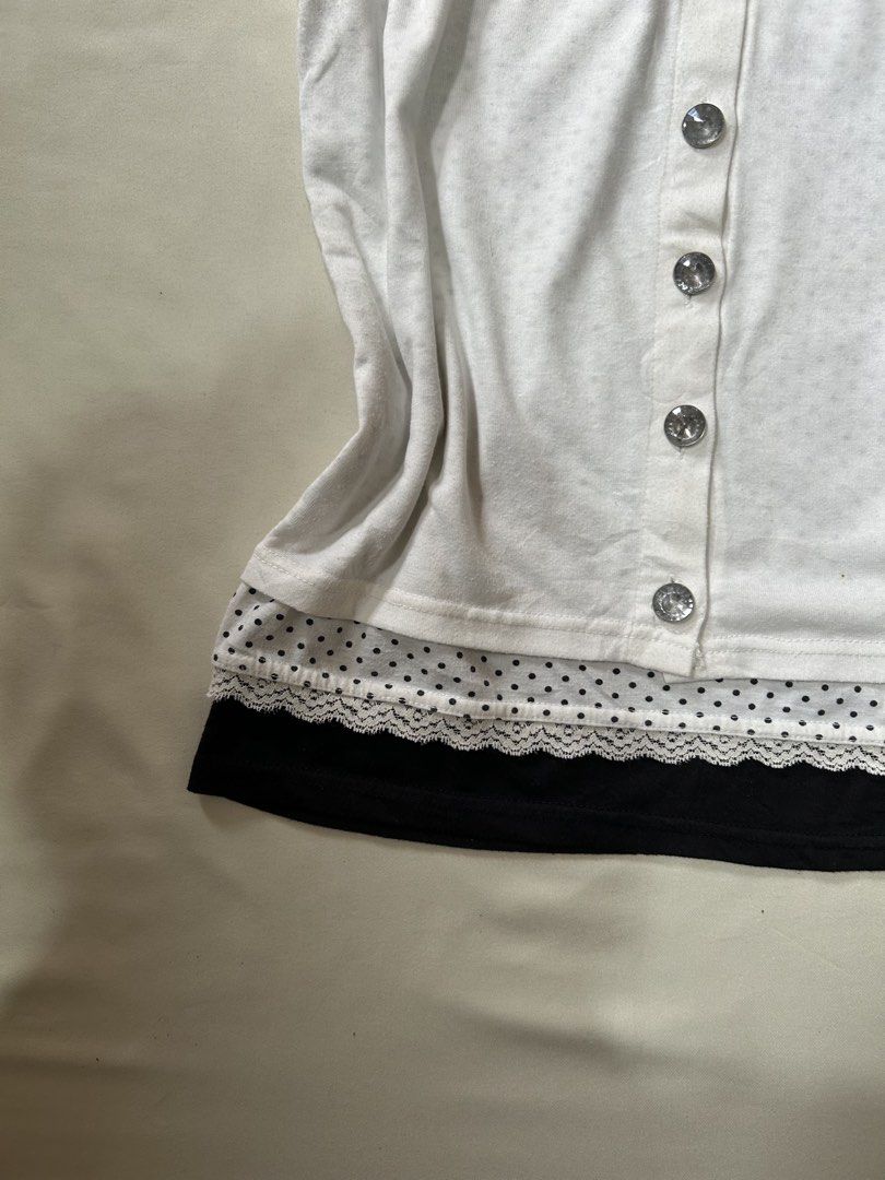 layered white&black dot pattern lace trim button tank top (Category: Sleeveless) located in Pagadian. Submitted by yowna_declutters (Listing ID 1466831536, Image 2). Description: y2k mori girl style —loc: pagadian city, mindanao payment first.