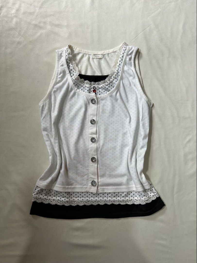 layered white&black dot pattern lace trim button tank top (Category: Sleeveless) located in Pagadian. Submitted by yowna_declutters (Listing ID 1466831536, Image 1). Description: y2k mori girl style —loc: pagadian city, mindanao payment first.
