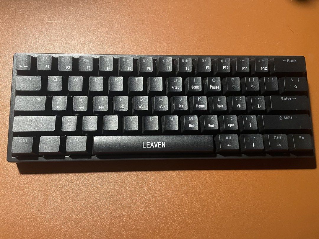 Leaven Compact Mechanical Keyboard Black (Category: Computer Keyboard) located in Quezon City. Submitted by maiispace (Listing ID 1466876844, Image 1). Description: Model: Leaven Mechanical Keyboard (Black) Layout: Compact with function row embedded in numbers Keycaps: English and Chinese character legends Bottom Row: Standard with dedicated spacebar branding Condition: Tested, working fine, clean overall .