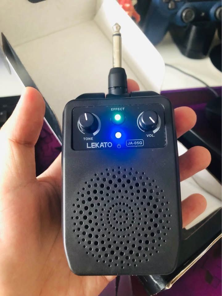 LEKATO Guitar Amp JA-05G (Category: Musical Instruments) located in Calamba. Submitted by joshuacasupang (Listing ID 1466868843, Image 1). Description: - LEKATO JA-05G pocket guitar amplifier in sleek black - Plugs straight into your electric guitar for instant playing - Built-in Bluetooth and rechargeable lithium battery for wireless convenience - Features tone/volume dials and a bass diaphragm for solid sound - Includes original retail box, per