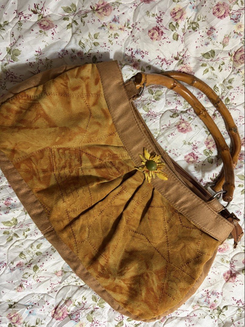 Leonardo Mustard Suede Bamboo Handbag (Category: Shoulder Bags) located in Muntinlupa City. Submitted by herellas0504 (Listing ID 1466904326, Image 2). Description: Leonardo Mustard Suede Bamboo Handbag Mine: 499 | Lock: 650 ———————————— small issue inside only (small hole needs to sew) other than that, no issue still in a good condition pretty smm! willing to.